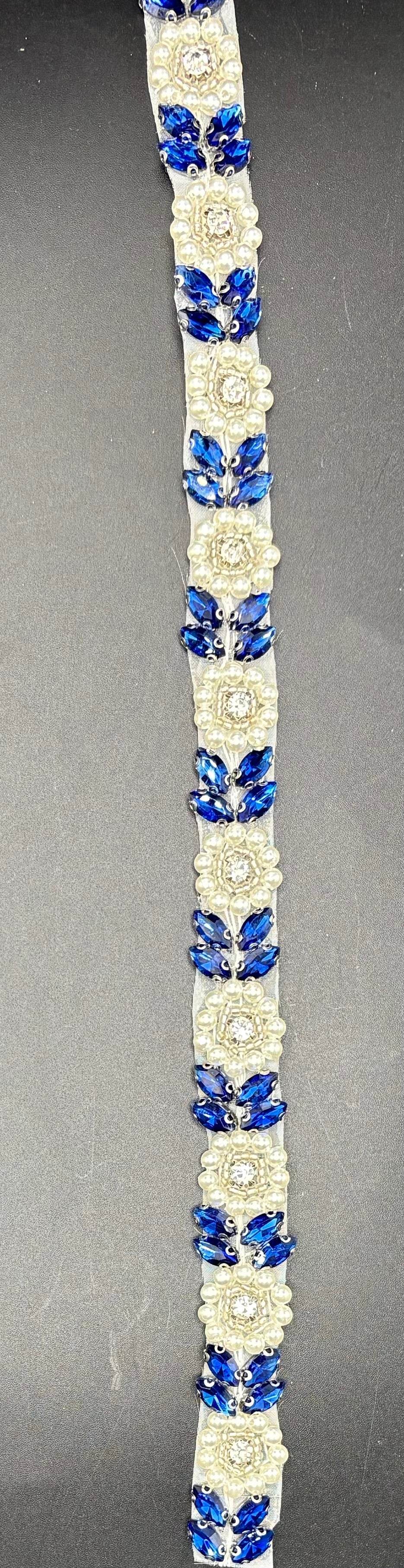 Natalie's Yardage with Pearls featuring blue rhinestones and pearls on fabric.