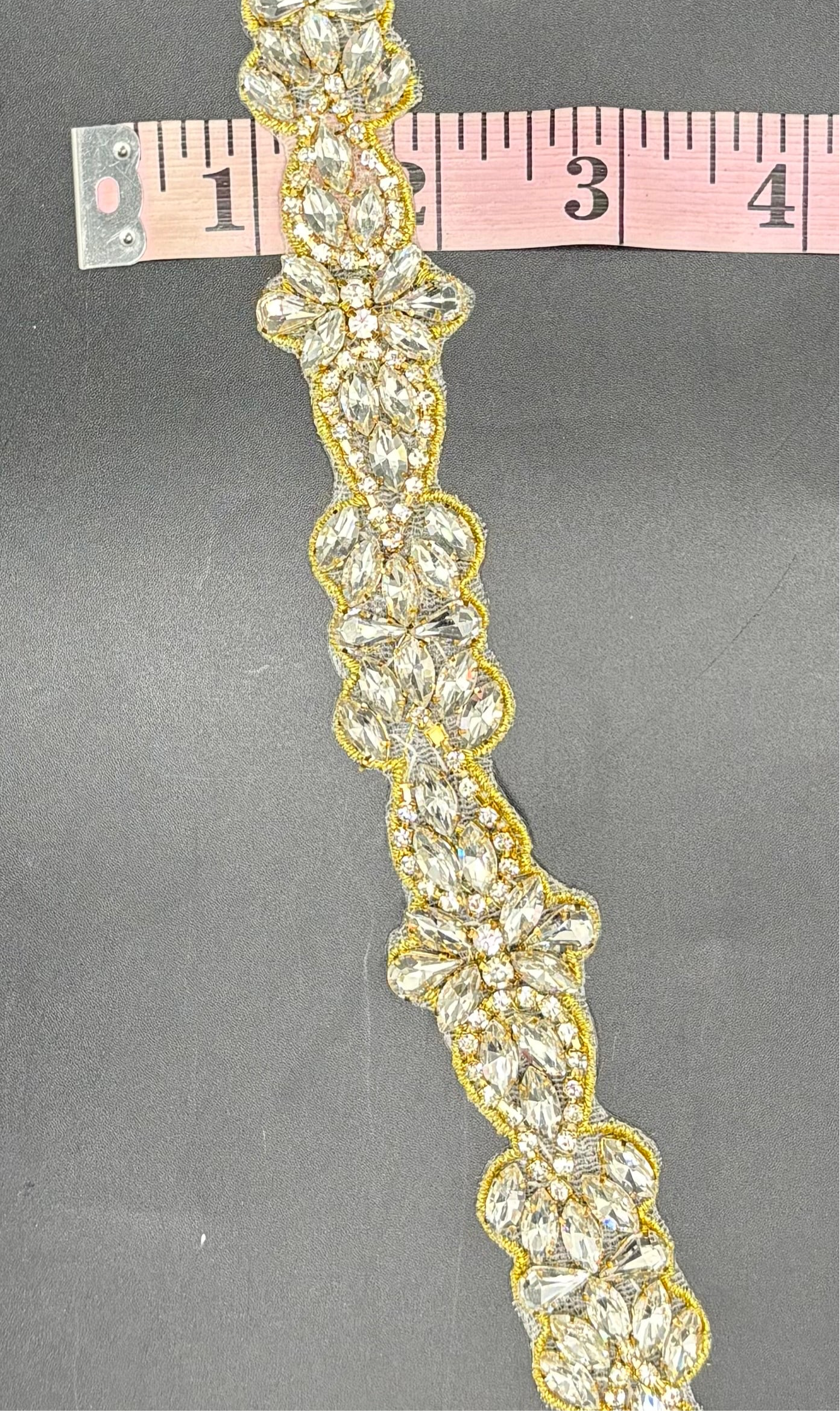 Emma's Yardage handmade rhinestone trim in various colors.