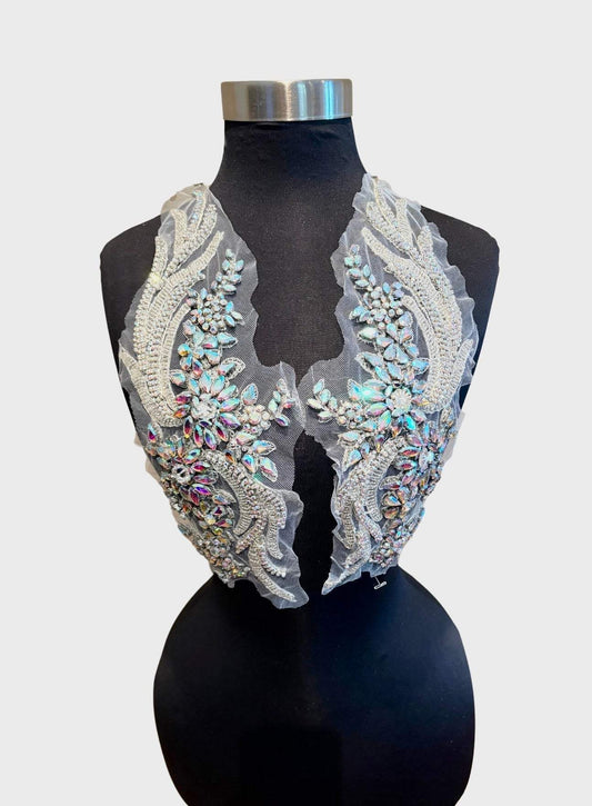Handmade rhinestone and glass bead appliqué pair on mannequin, perfect for bridal and couture fashion.