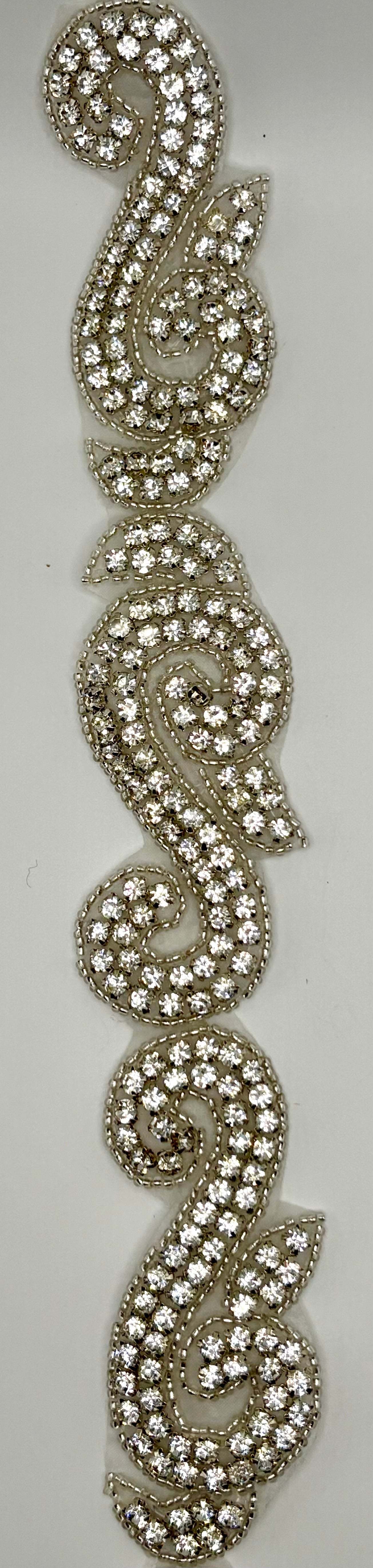 Rhinestone Scroll Yardage in clear rhinestones with silver detailing, 1 1/2" width.