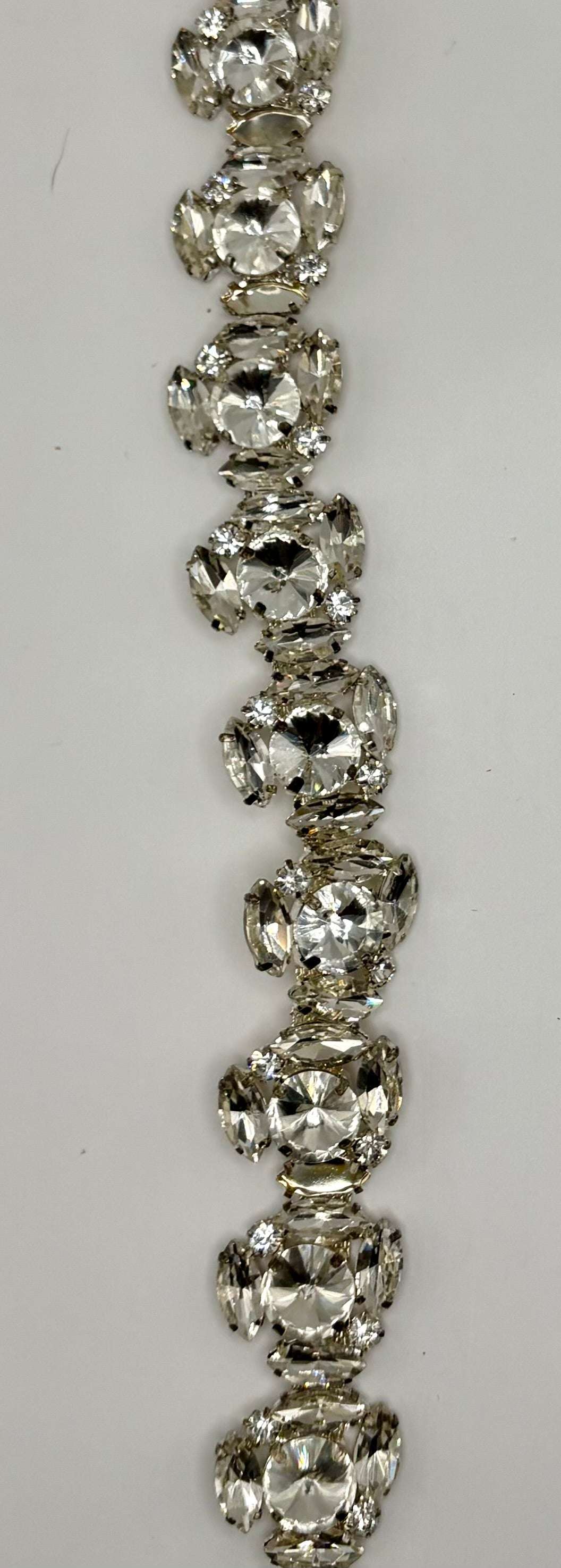 Large rhinestone cluster on chain back yardage, clear/silver, 1-inch width.
