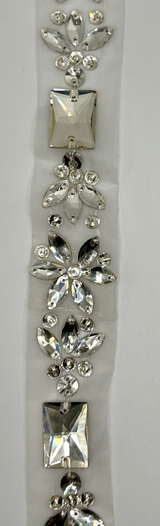 Grandiose Original rhinestone yardage with intricate design on chain backing.
