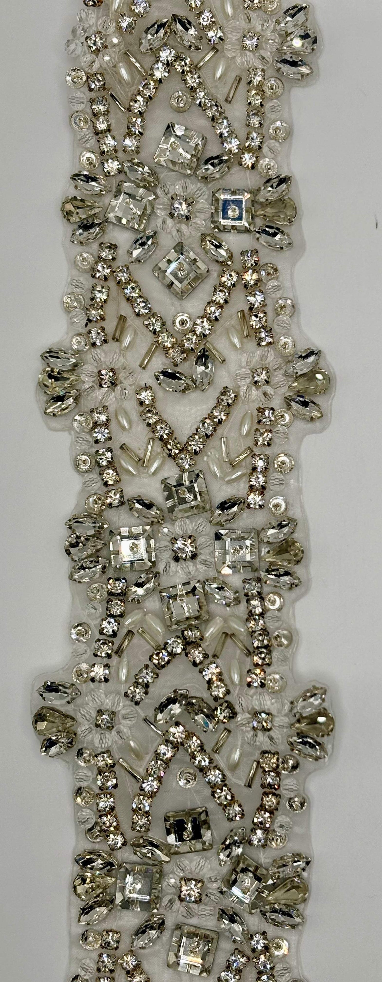 "Rapuzel" Yardage with clear rhinestones, silver back, and beads, 2 3/4" wide.