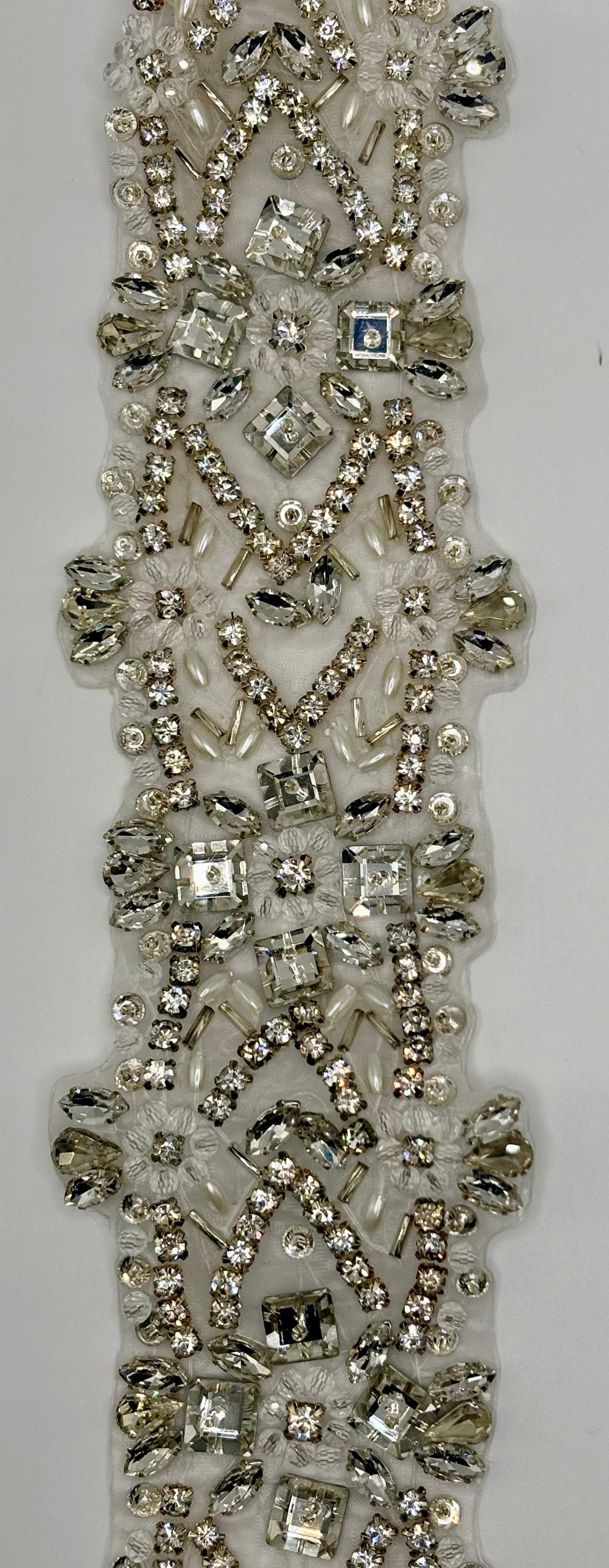 "Rapuzel" Yardage with clear rhinestones, silver back, and beads, 2 3/4" wide.