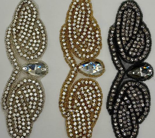 Romance Yardage rhinestone trim in silver, gold, and black.