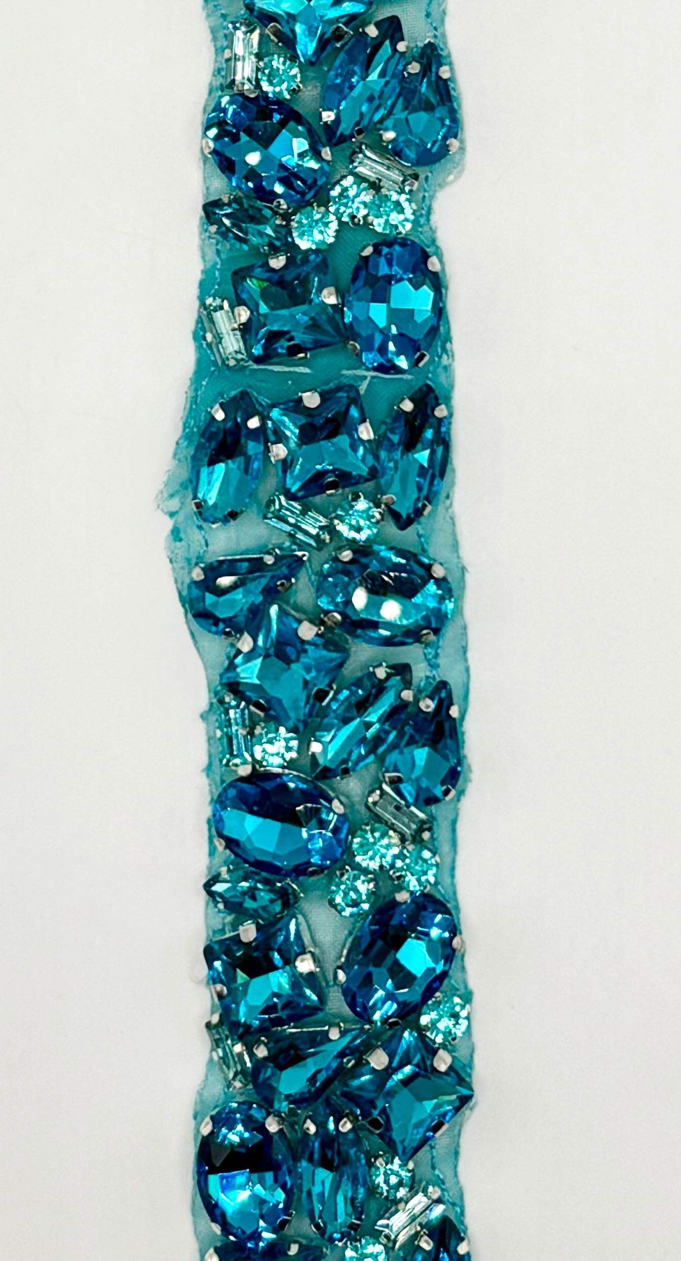 Handmade multi-colored rhinestone yardage, 1" wide, featuring vibrant stones for versatile embellishments.