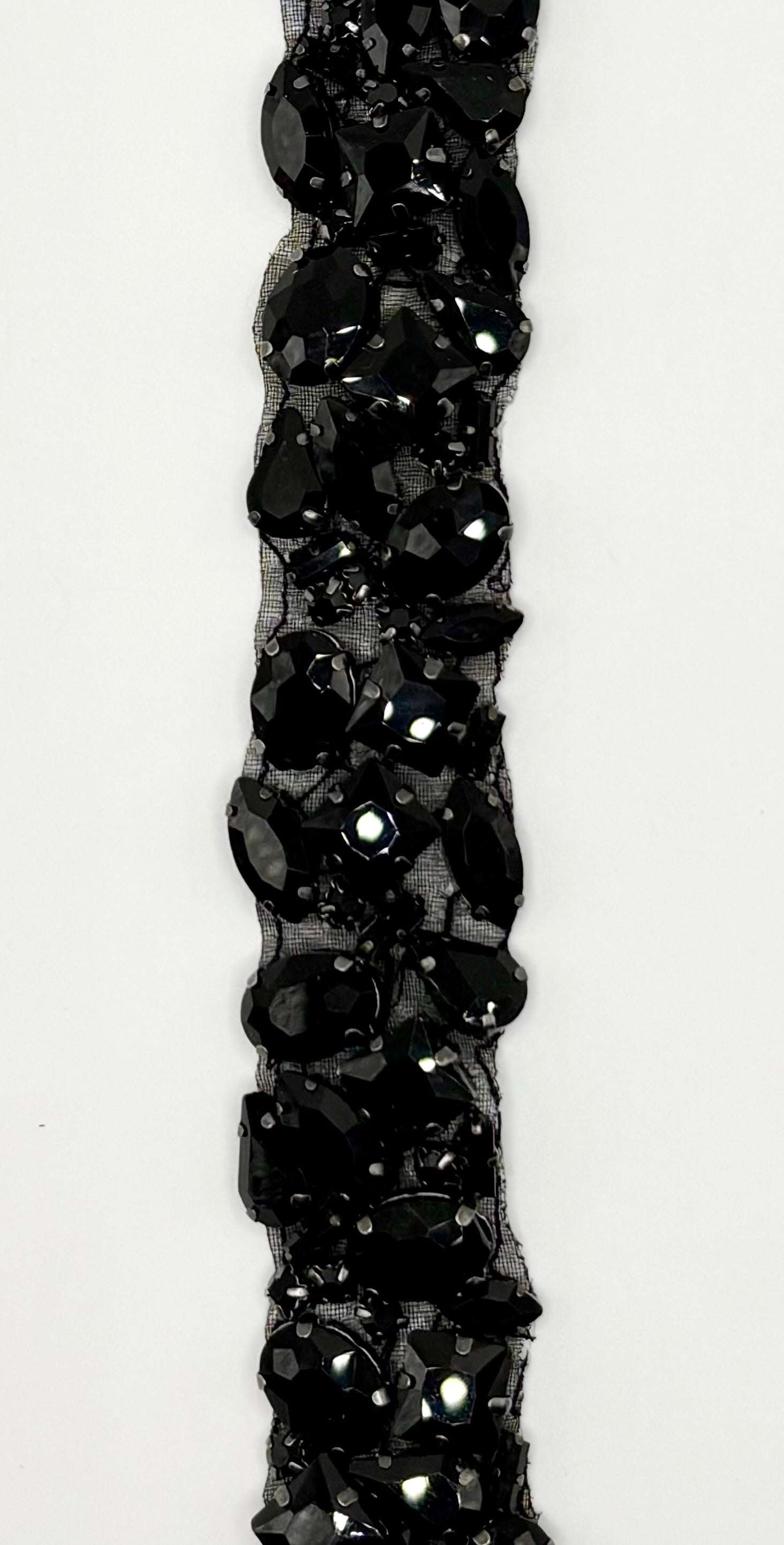 Handmade 1" wide multi-colored rhinestone yardage trim for versatile embellishing.