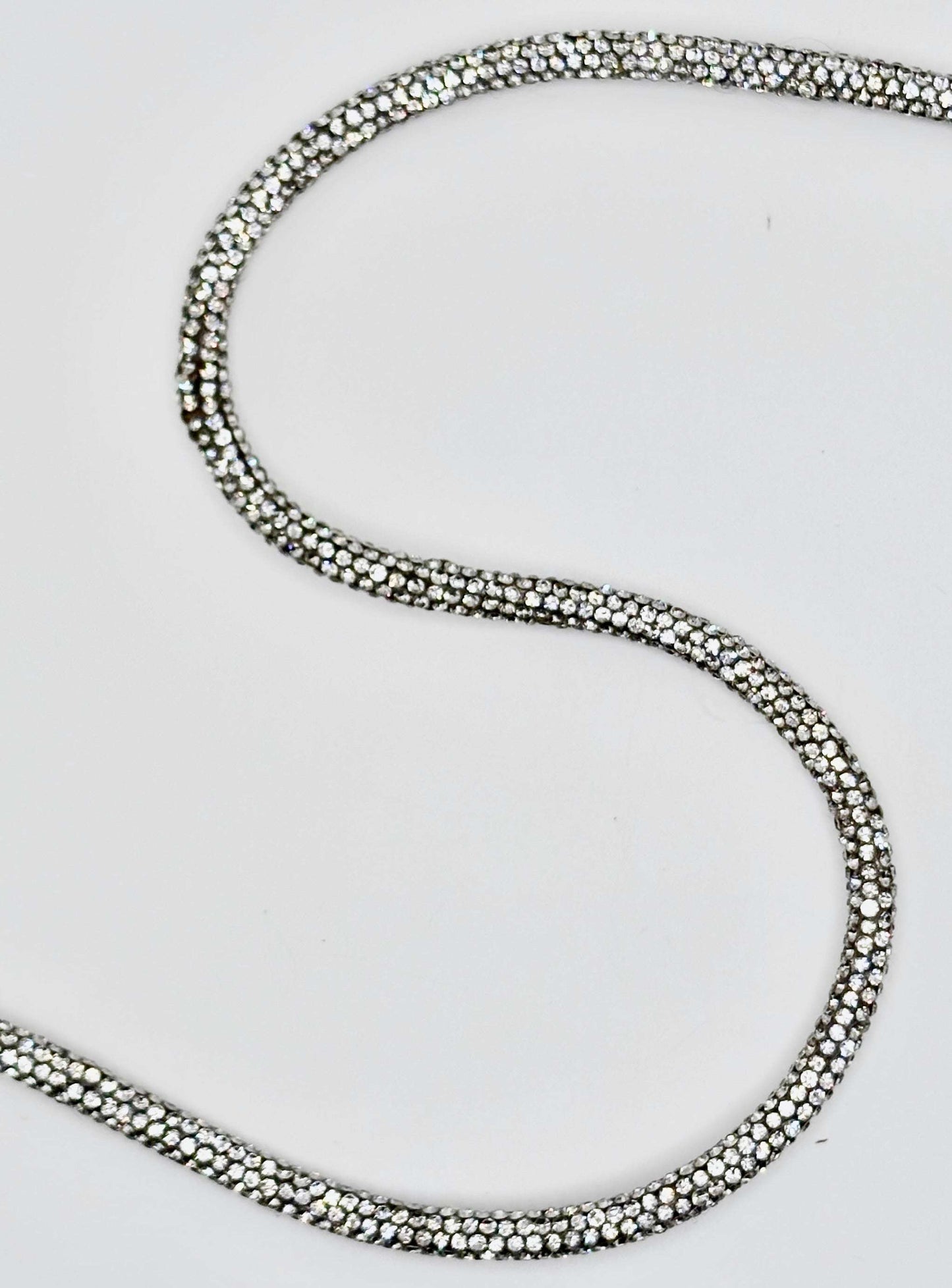 6MM full-round rhinestone rope yardage with continuous brilliance and sparkling design.