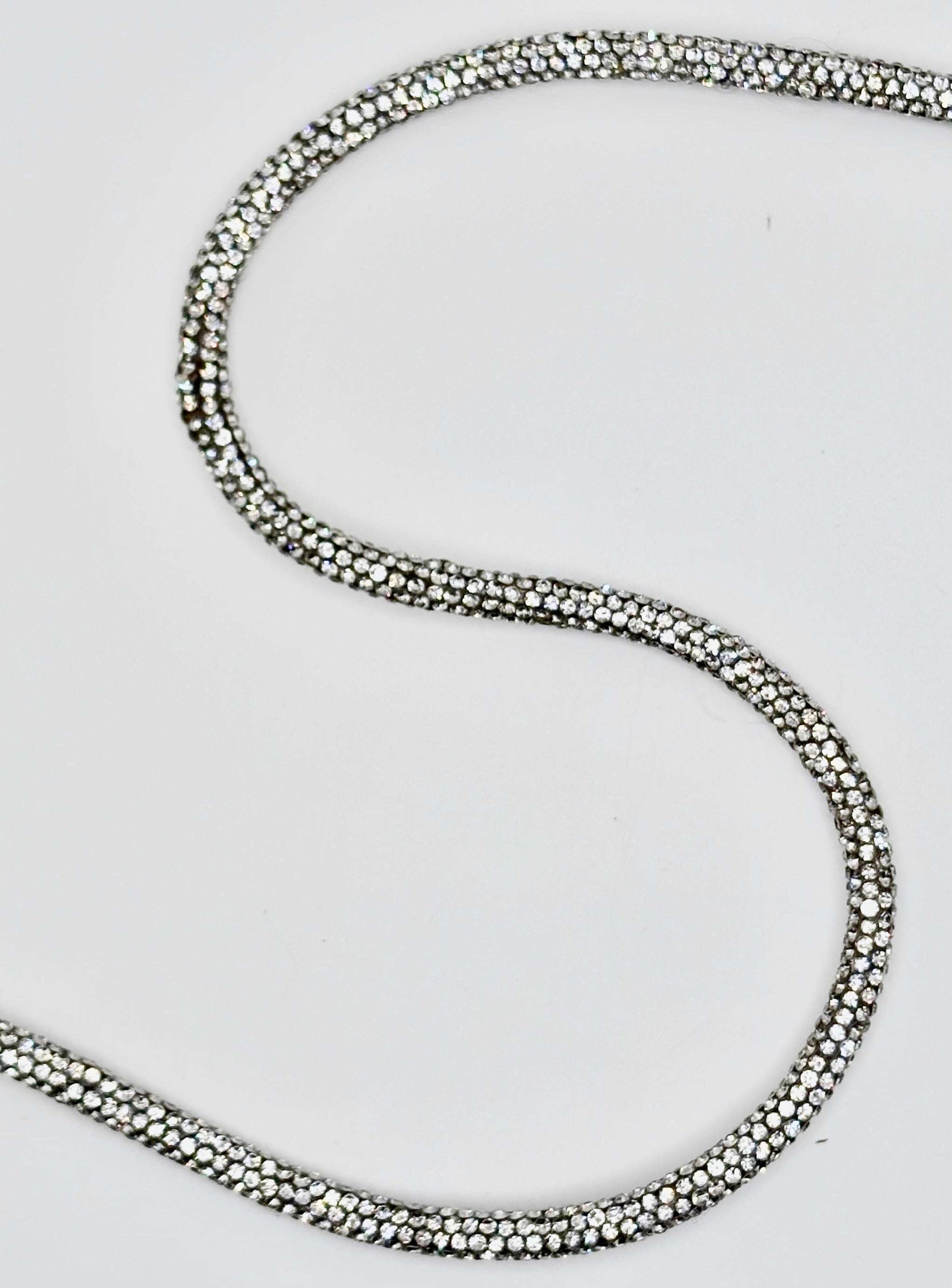 6MM full-round rhinestone rope yardage with continuous brilliance and sparkling design.