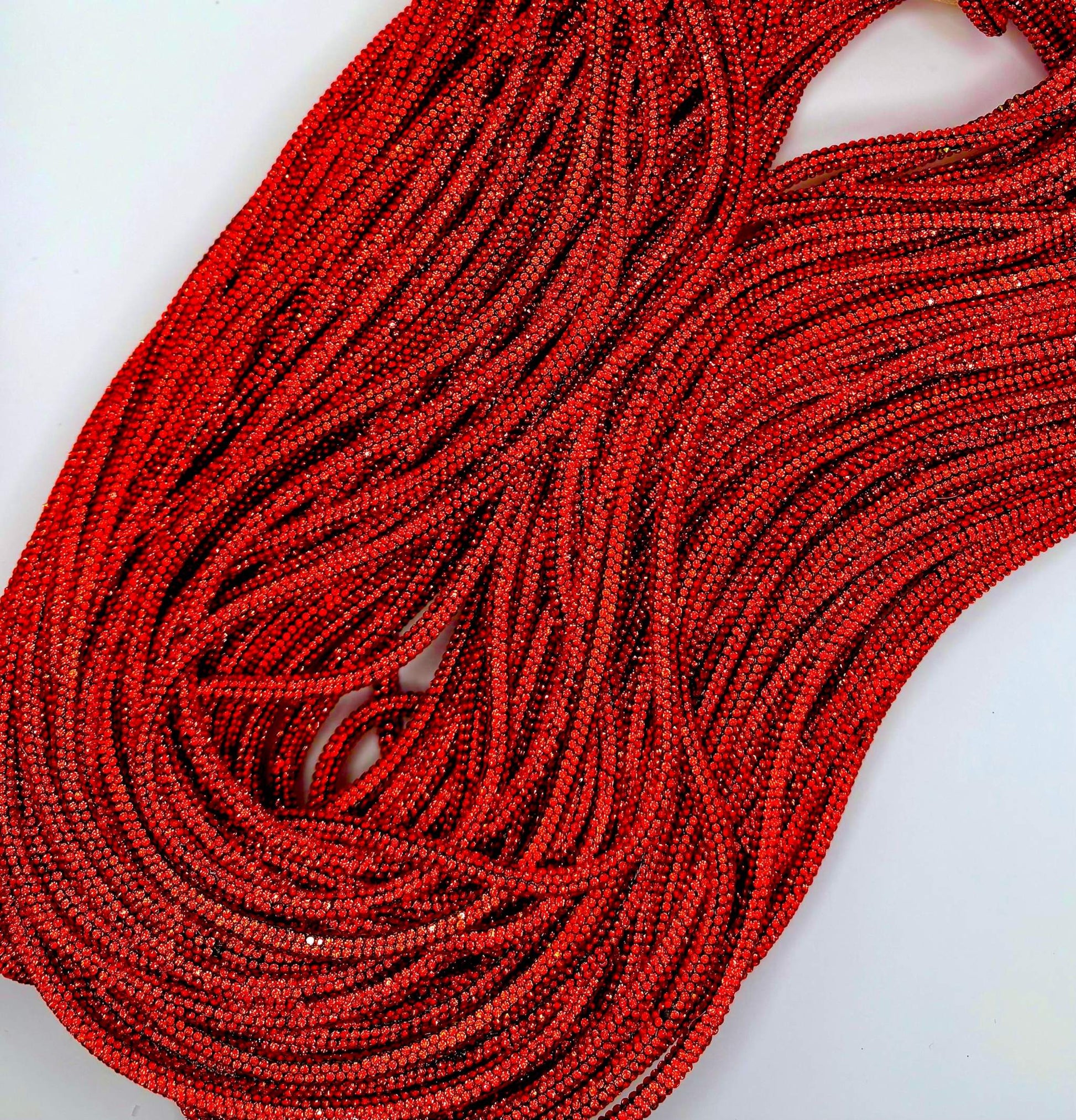 6MM red rhinestone rope yardage for luxury crafts and fashion designs.