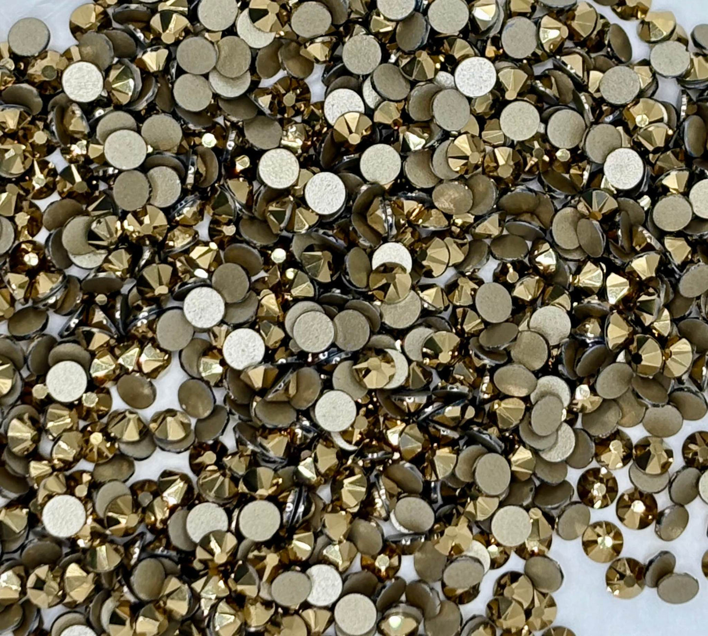 SS20 Flat Back Rhinestones, 144 pieces, 16 cut design.