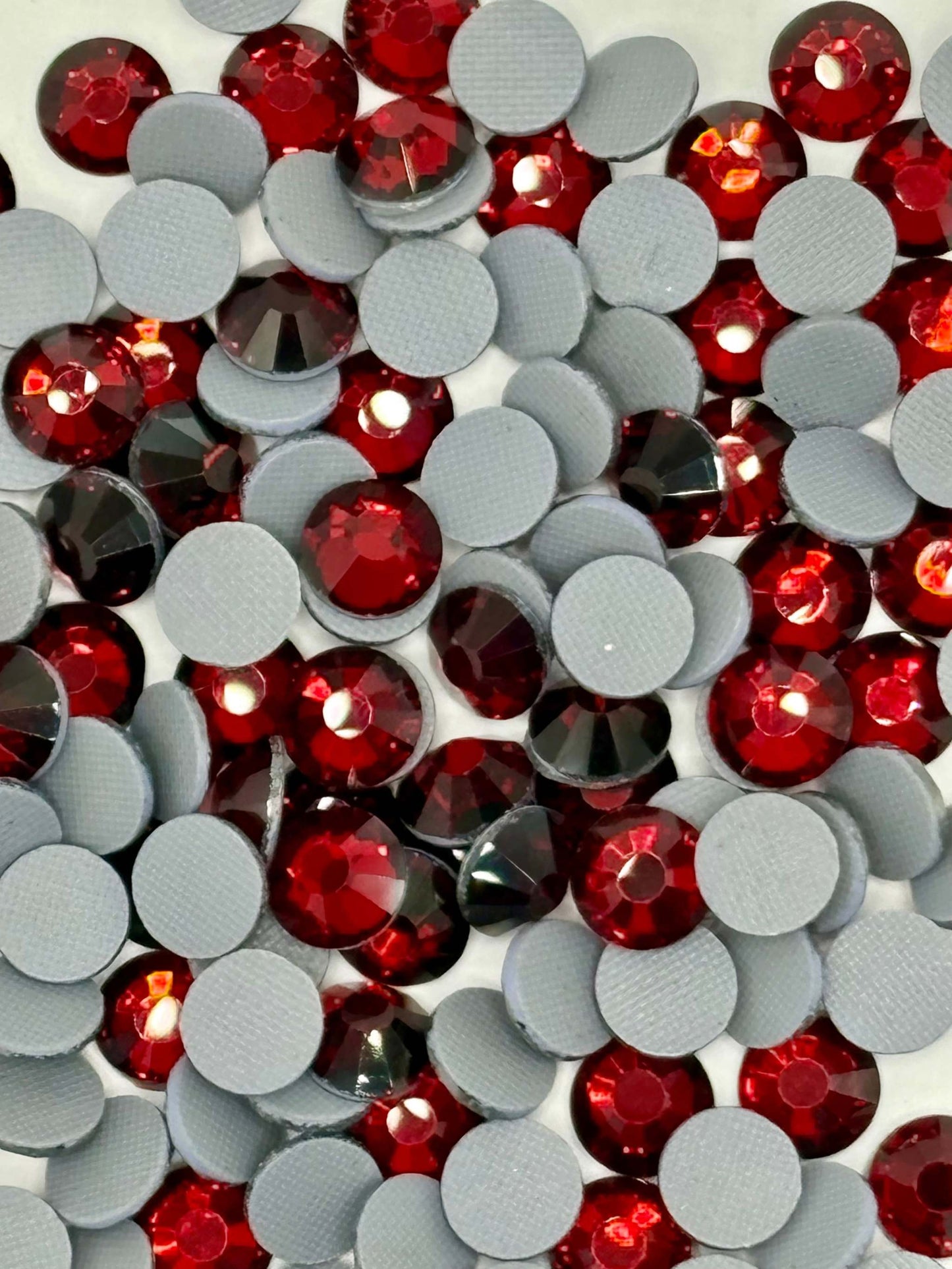 34SS Flat Back Rhinestones in red, close-up view, 1 gross (144 pieces).