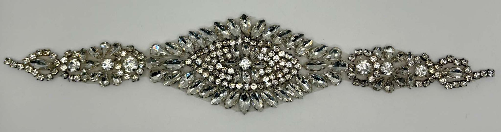 Della handmade Rhinestone Belt with clear rhinestones on silver, approximately 11 inches.