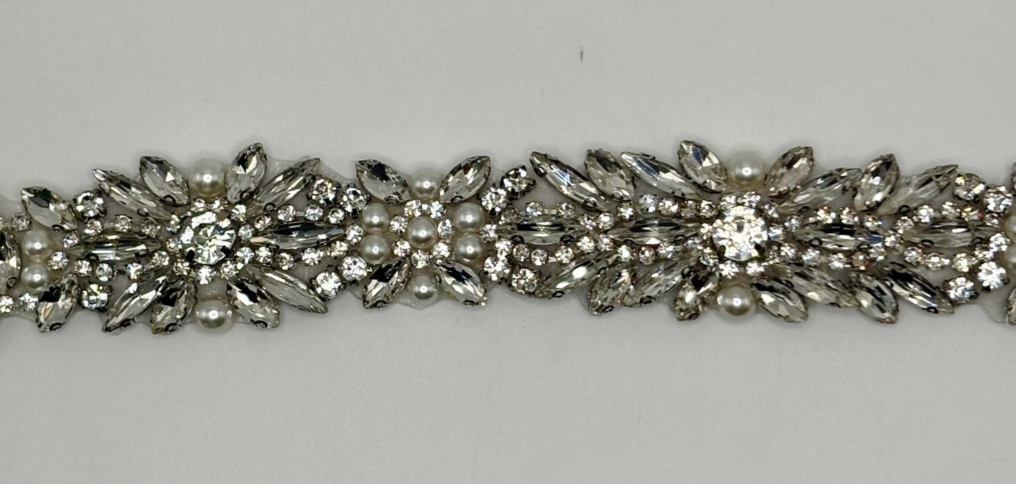 Handmade bridal belt with rhinestones and pearls.