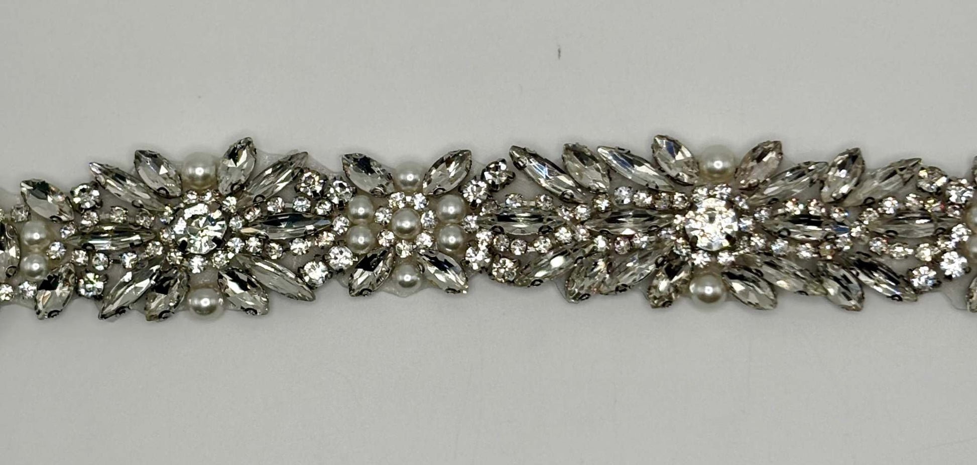 Handmade bridal belt with rhinestones and pearls.