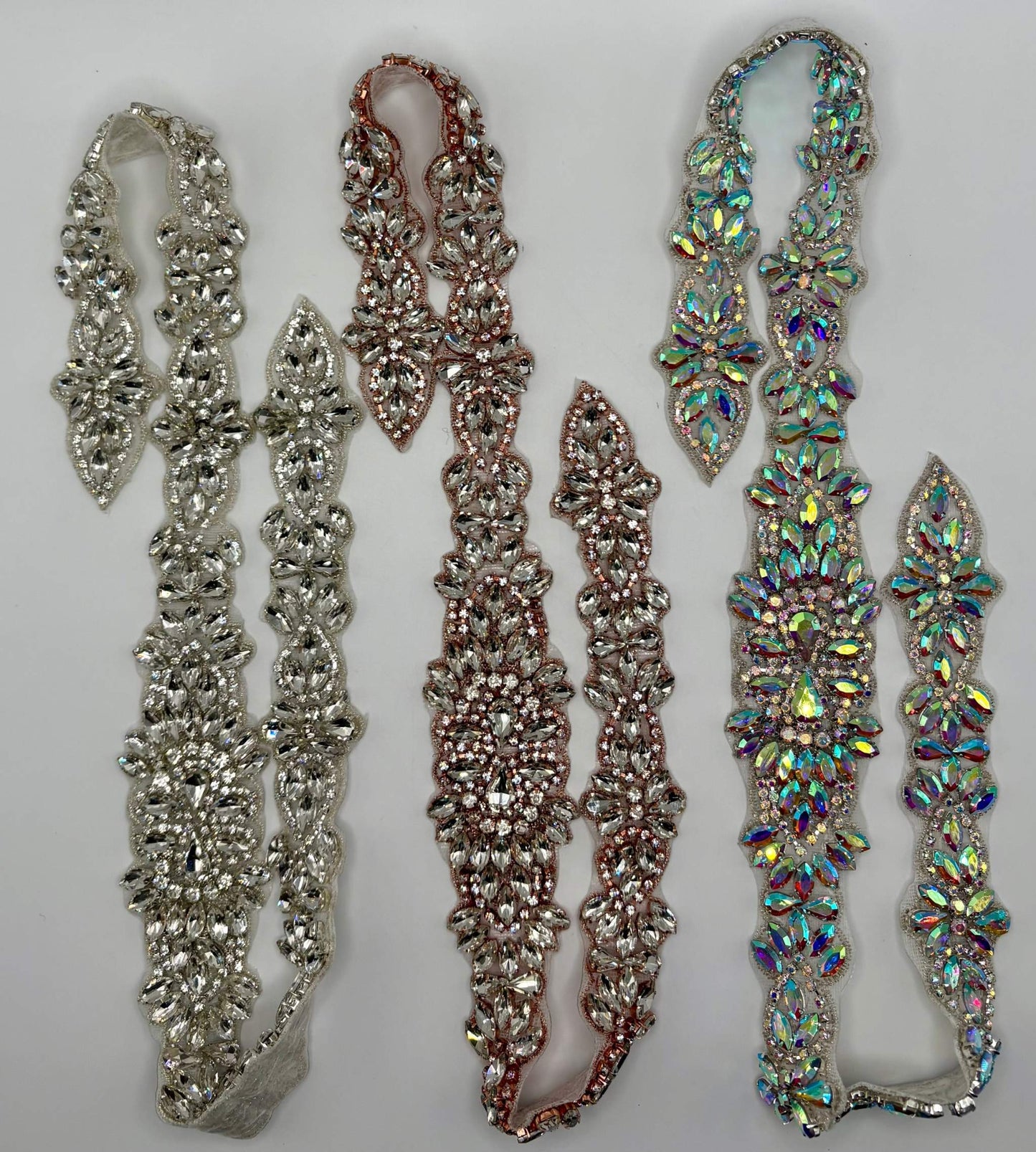 Handmade rhinestone bridal belts with pearls and glass beads in gold.