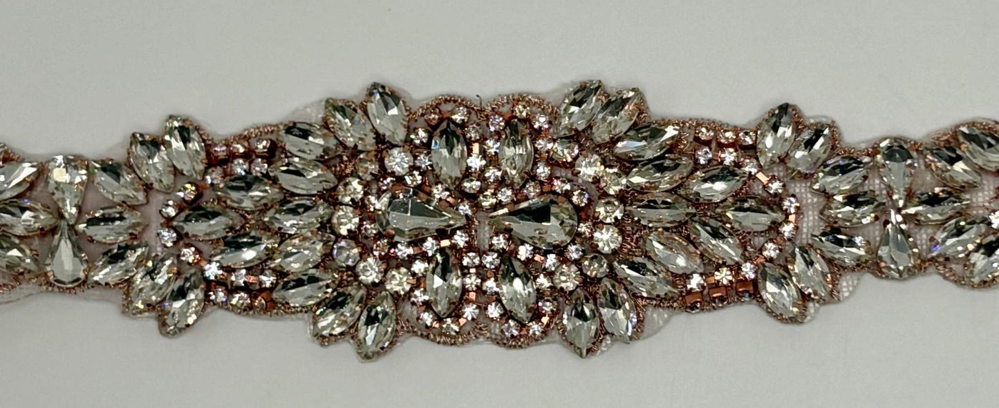 Handmade rhinestone bridal belt with clear rhinestones, pearls, and glass beads in gold.