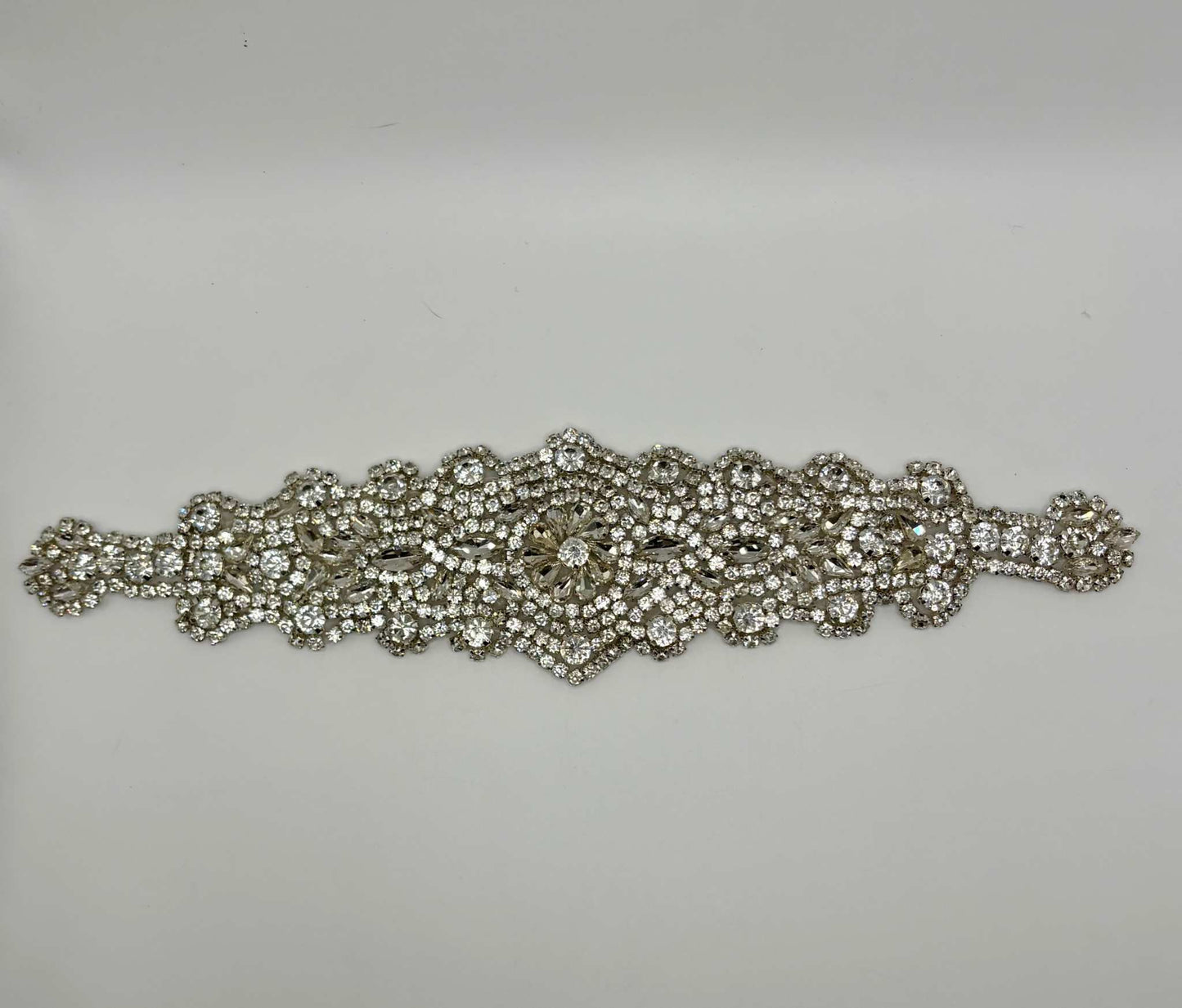 Handmade rhinestone bridal belt, approximately 12 inches long, with intricate design details.