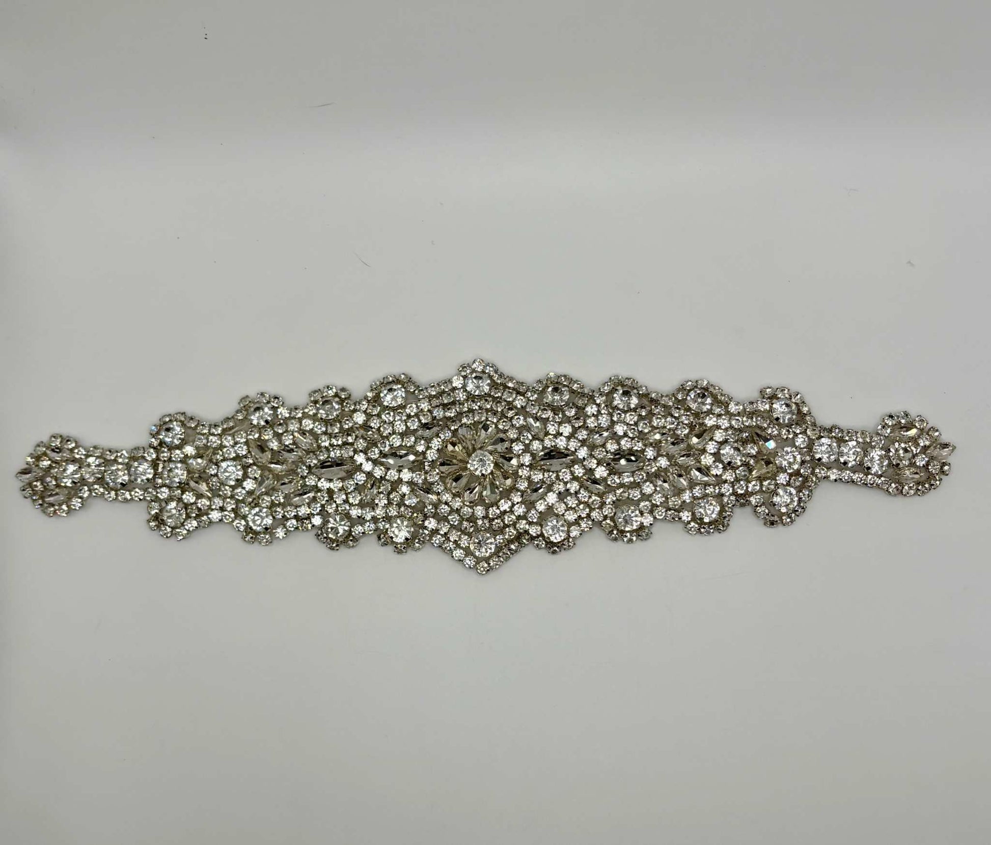 Handmade rhinestone bridal belt, approximately 12 inches long, with intricate design details.