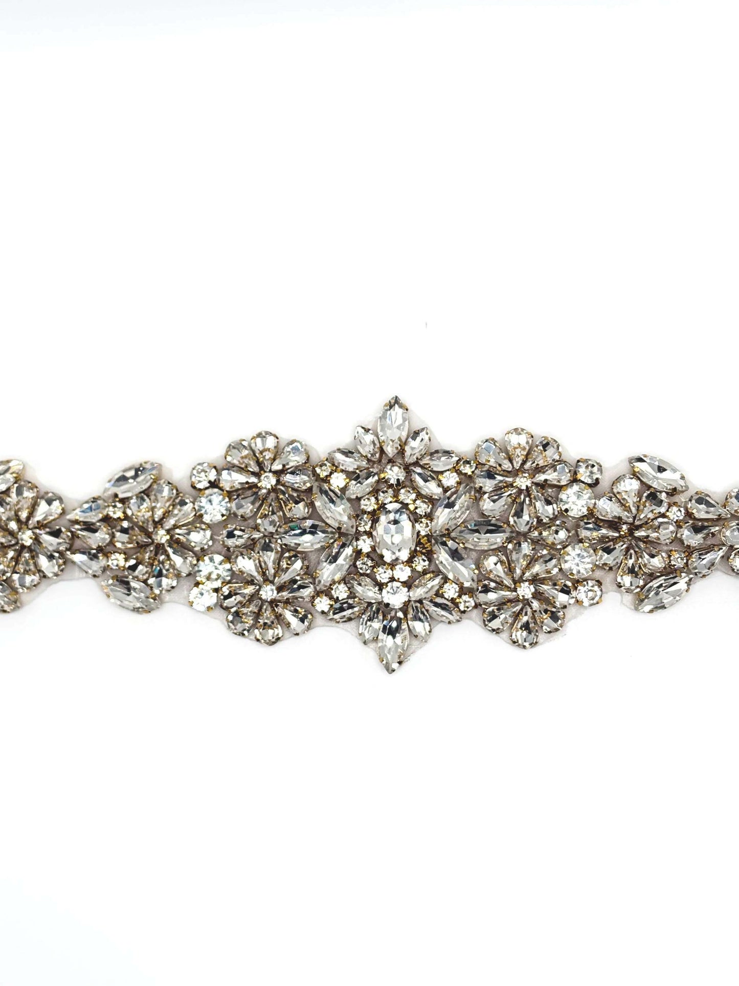 Carina Rhinestone Belt Accent in silver with intricate floral design and clear stones.