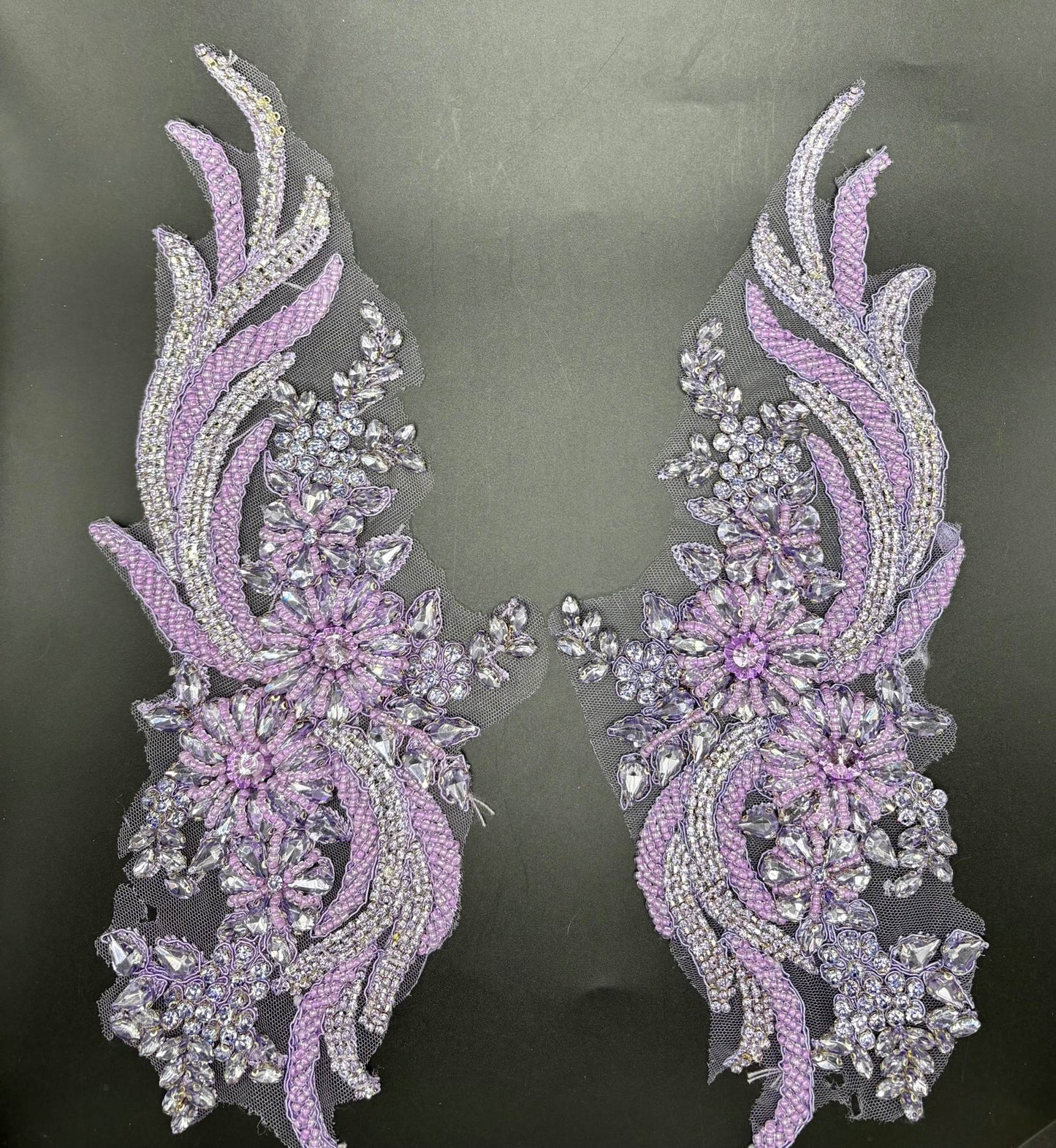 Elegant handmade rhinestone and glass bead appliqué pair for luxurious fashion designs.