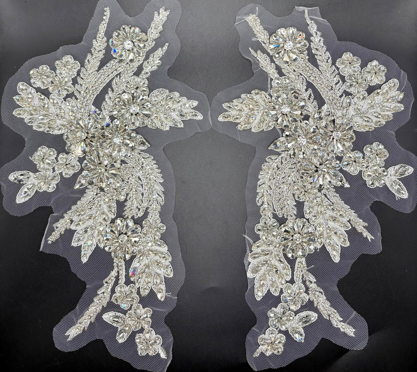 Handmade rhinestone pair appliqué in various colors, 11-inch length, for elegant design accents.
