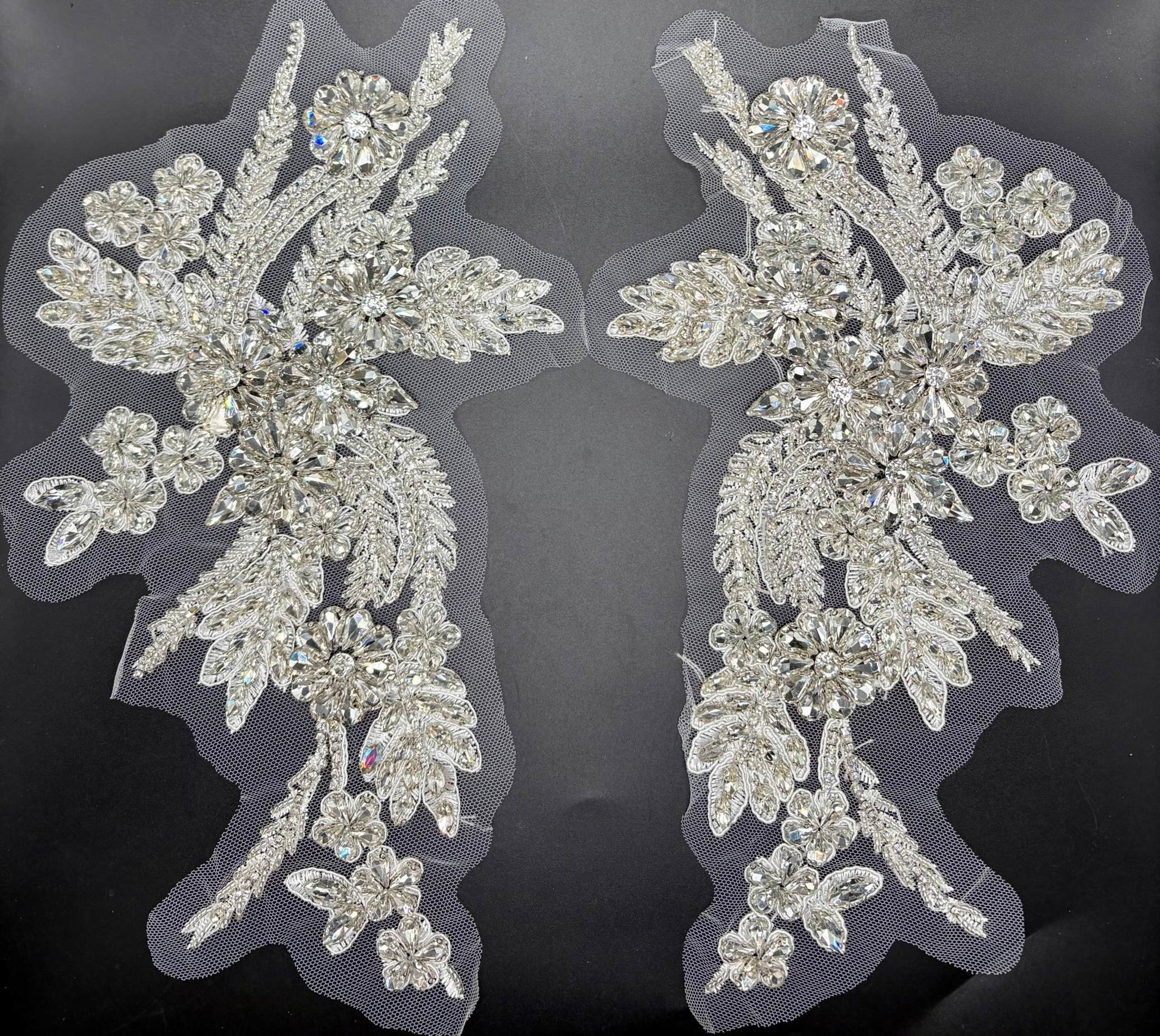 Handmade rhinestone pair appliqué in various colors, 11-inch length, for elegant design accents.