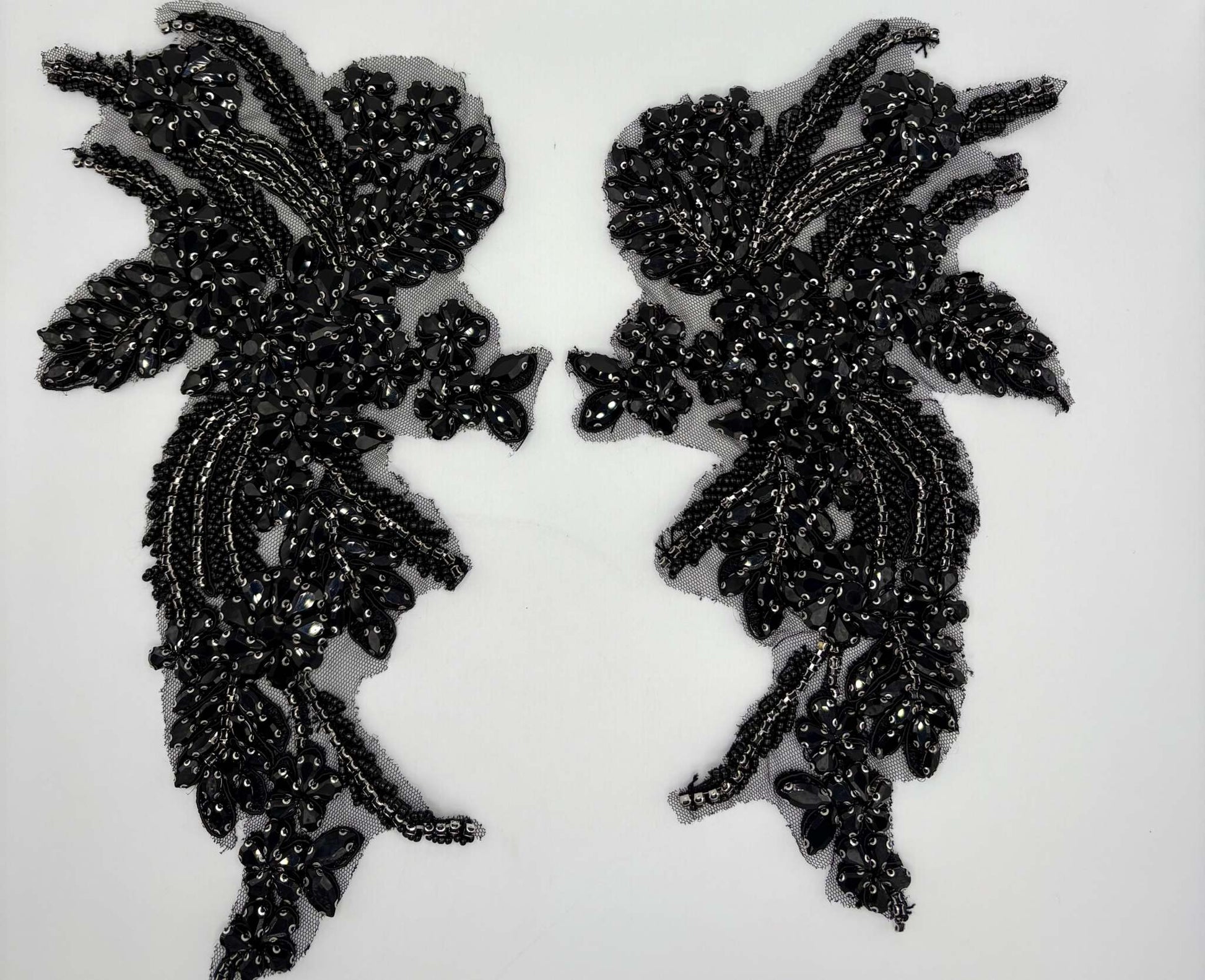 Handmade rhinestone appliqué pair in black, approx. 11 inches, intricately designed for elegant projects.