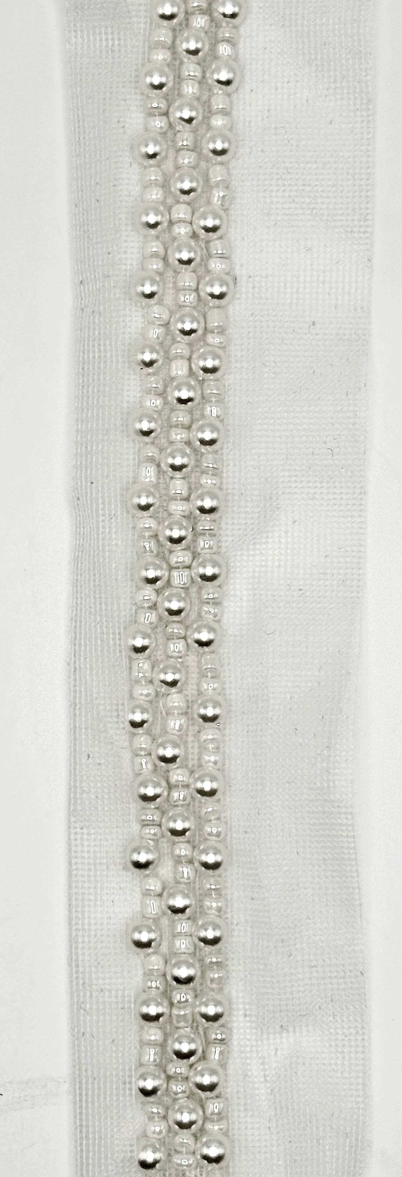 Handmade Pearl Trim – 1/4" Wide on White Lace, featuring lustrous pearls on soft white lace.